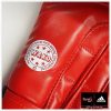 400311820-boxing-gloves-adidas-wako-national-leather-red-closeup-800×800