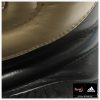 4003140300-boxing-gloves-adidas-hybrid-300-leather-black-gold-closeup5-800×800